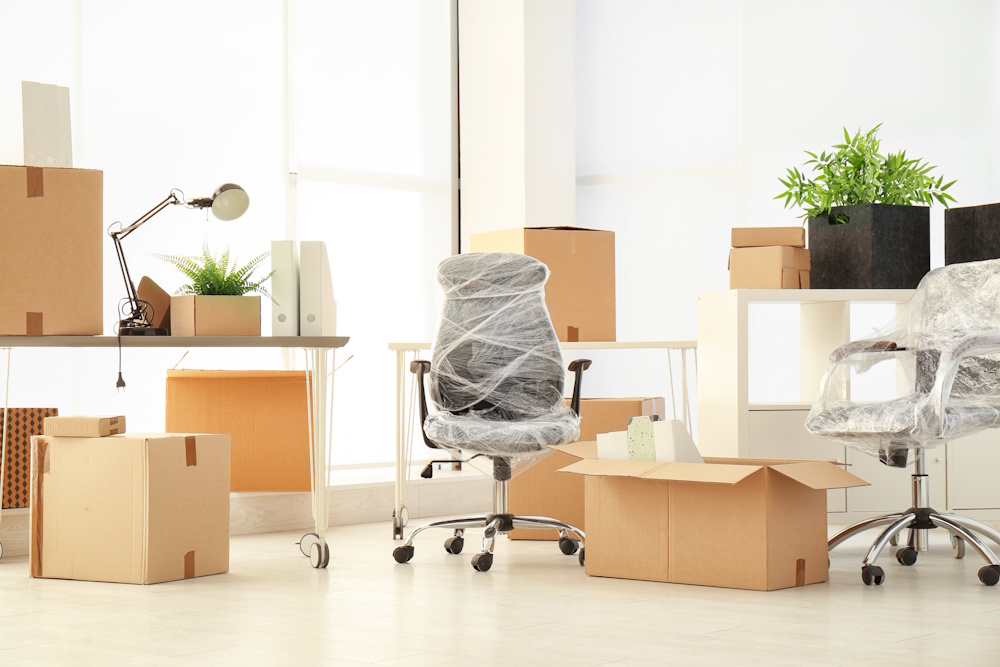 office packed up in moving boxes
